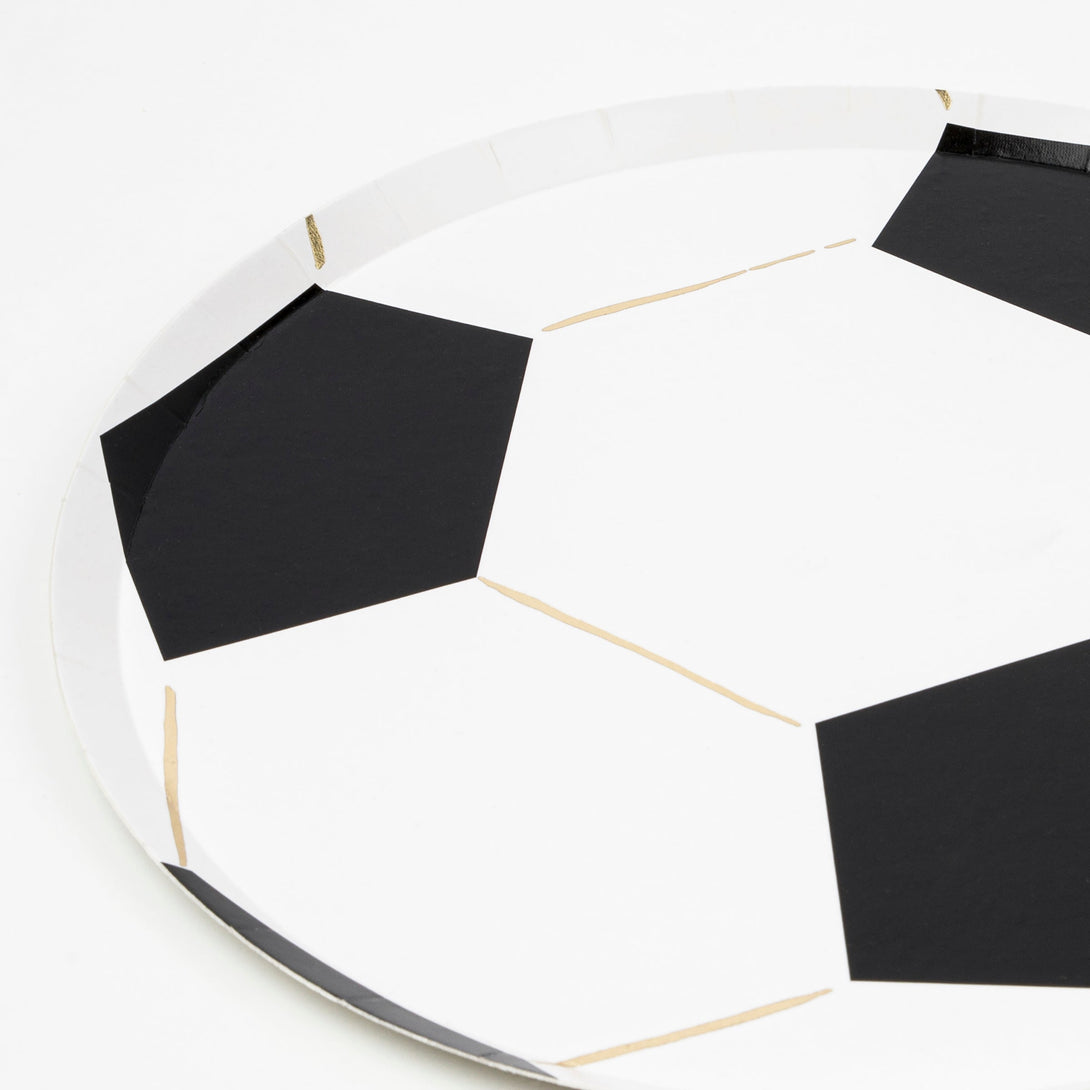 Our paper plates are cut into the shape of a soccer ball with fabulous gold foil details.