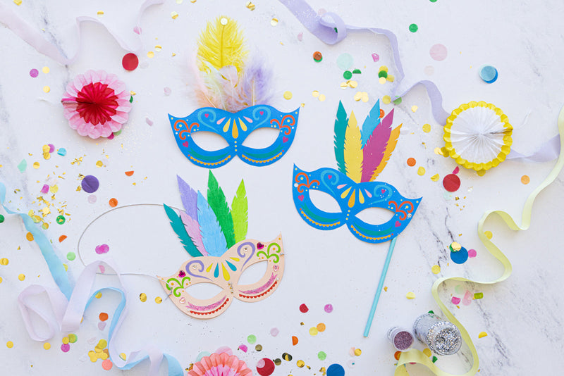 Flat lay of print out carnival masks
