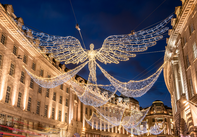 A London Street with an angel made from Christmas Lights