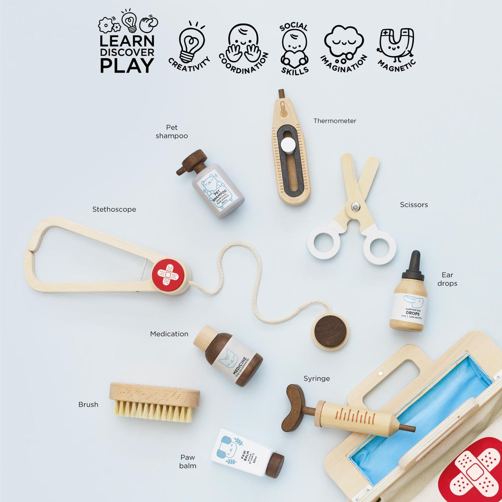 Wooden vet tools including a stethoscope, syringe and bottles