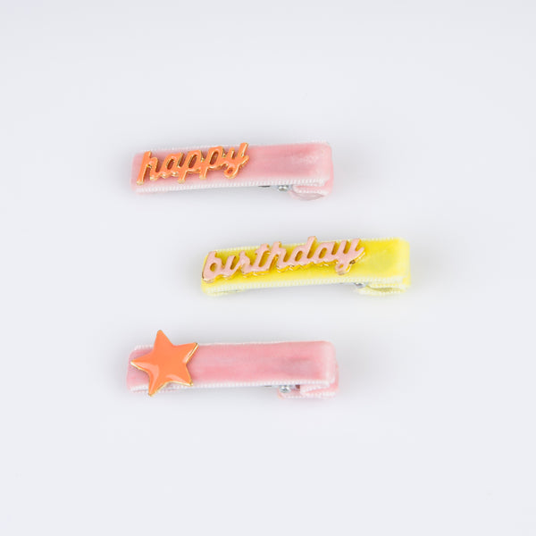 Our hair accessories for kids are charming birthday candle shaped clips with velvet ribbon and enamel details. Image4