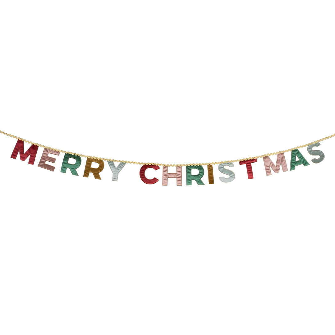 Our Merry Christmas garland is made in velvet with a mix of traditional and modern colors and metallic gold ric rac.