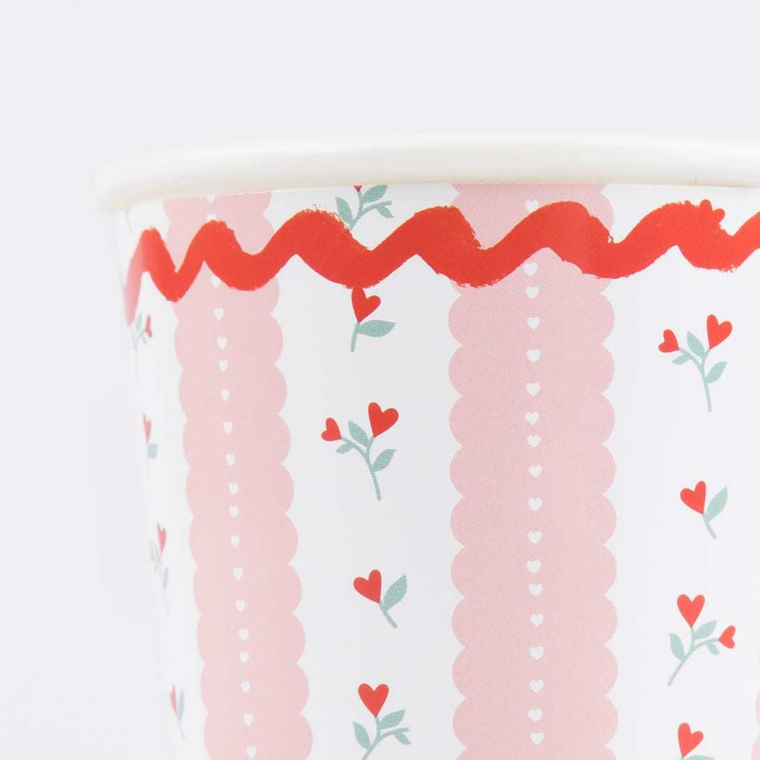 Our pink paper cups, with red roses, are the perfect party cups for a Valentine's meal.