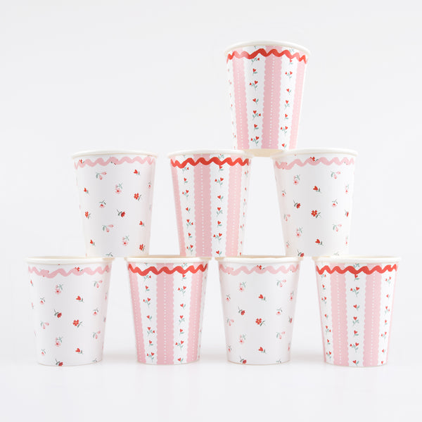 Our pink paper cups, with red roses, are the perfect party cups for a Valentine's meal.