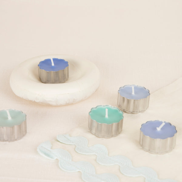 Our blue and green small candles, with stylish scalloped edges, are perfect to decoration any room. Image2
