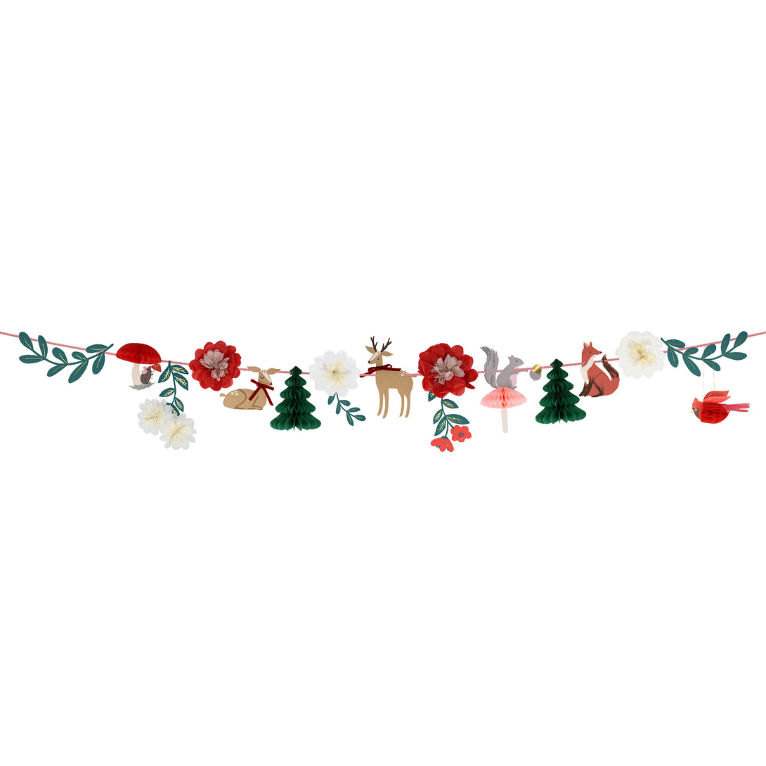 Our Christmas paper garland has traditional colors of red and green, with woodlands animals, trees and flowers for a charming effect.