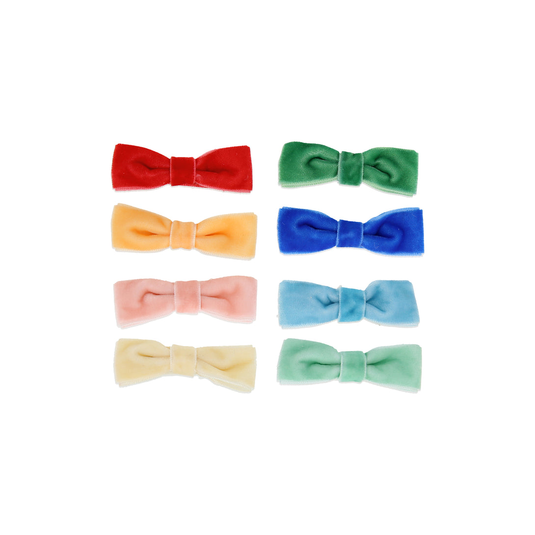 Our hair clips feature different colored velvet bows, with gold tone clips, for stylish hair accessories.