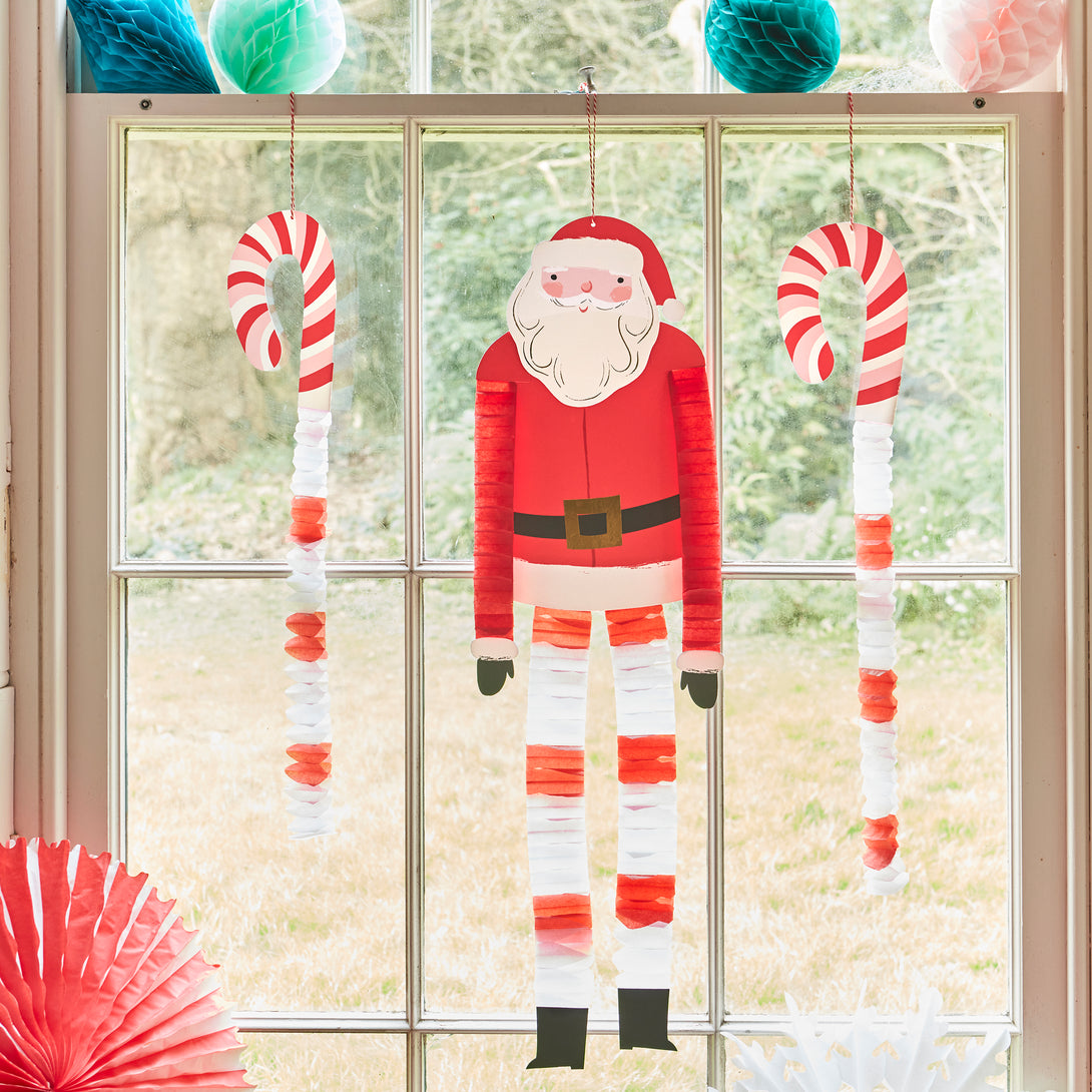 Our large Christmas hanging decorations include Santa, a reindeer and candy canes, with fun honeycomb details for a stunning effect.