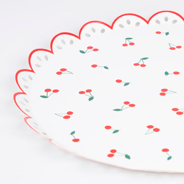 Use our special cherry party supplies for a vibrant look at your parties, our set includes paper plates, cups, napkins and a honeycomb garland. Image7