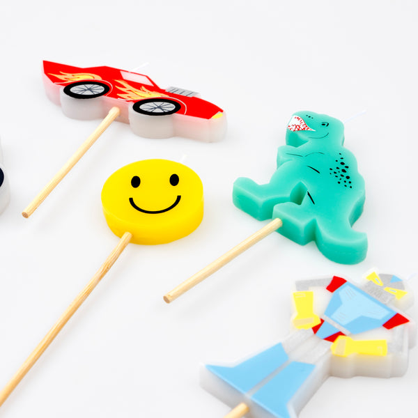 Our Toybox party set includes tableware, candles, party bags and a garland all with vibrant retro designs, ideal for fun birthday parties. Image1