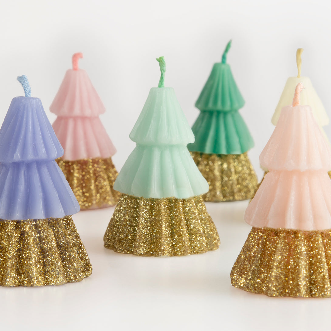 Our Christmas candles, in the shape of Christmas trees, are colorful and glittery, are perfect as a host gift.