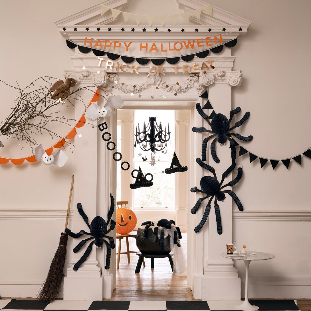 Our large paper spider decorations are the perfect Halloween decorations if you want an eerie fun look. Image2