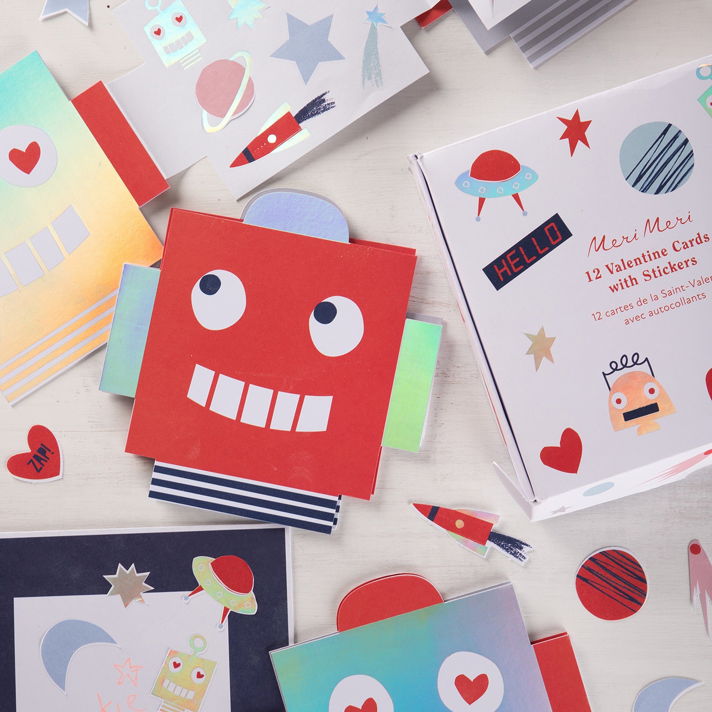 Our kids valentines cards also feature colorful space stickers.