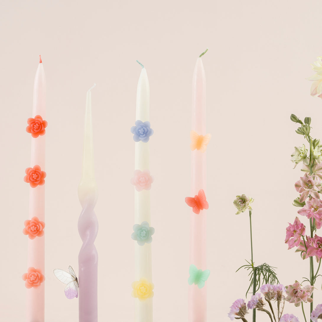 Make any pink party look amazing with our taper candles with pink flowers and pink wicks.