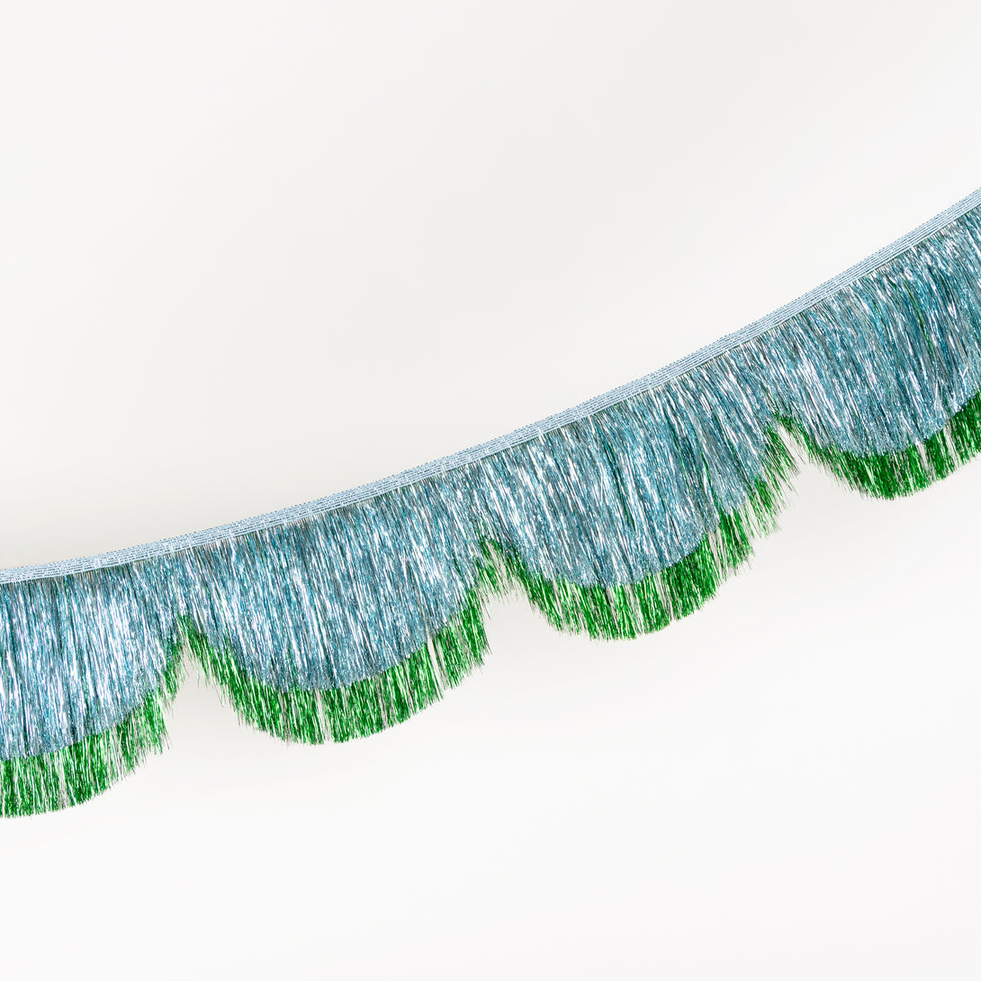 Use our blue and gren tinsel garland to make your Christmas celebrations and New Year parties look stylishly elegant. Image2