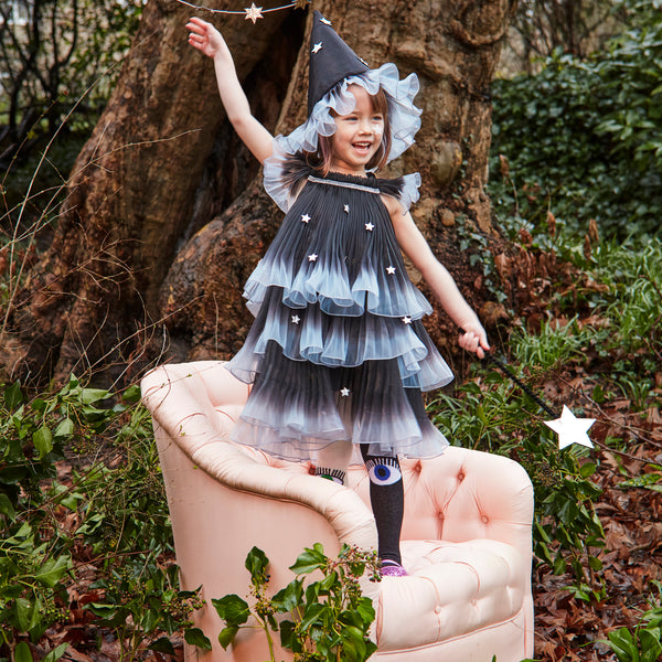 Our witch costume, with a witch hat, dress and wand, is the perfect kids Halloween costume for those who love to look magical.