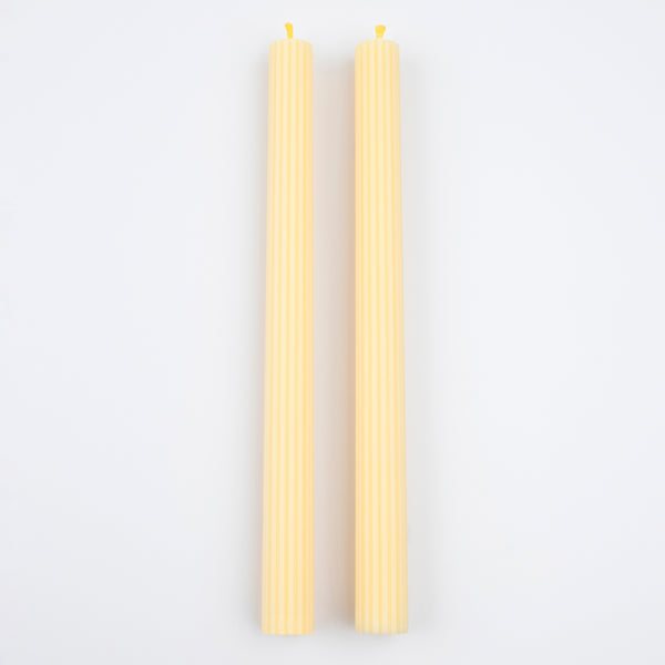 Our long candles, in a cheery yellow, look amazing on the mantel or table.