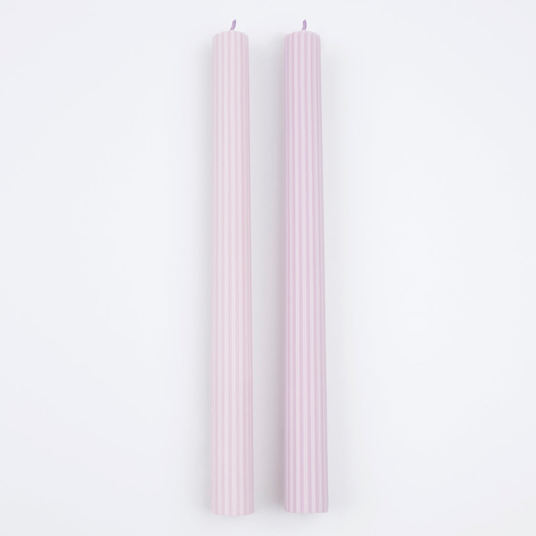 Our tall candles, in a lilac color, are perfect for any party with a purple theme.