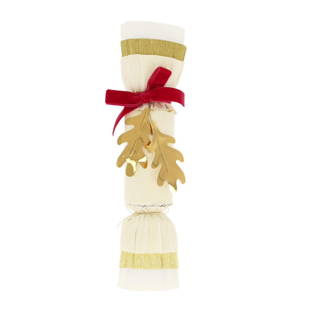 Our Thanksgiving crackers are made with crepe paper, golden leaves and velvet bows, and each have a luxury gift of a brooch or keyring.