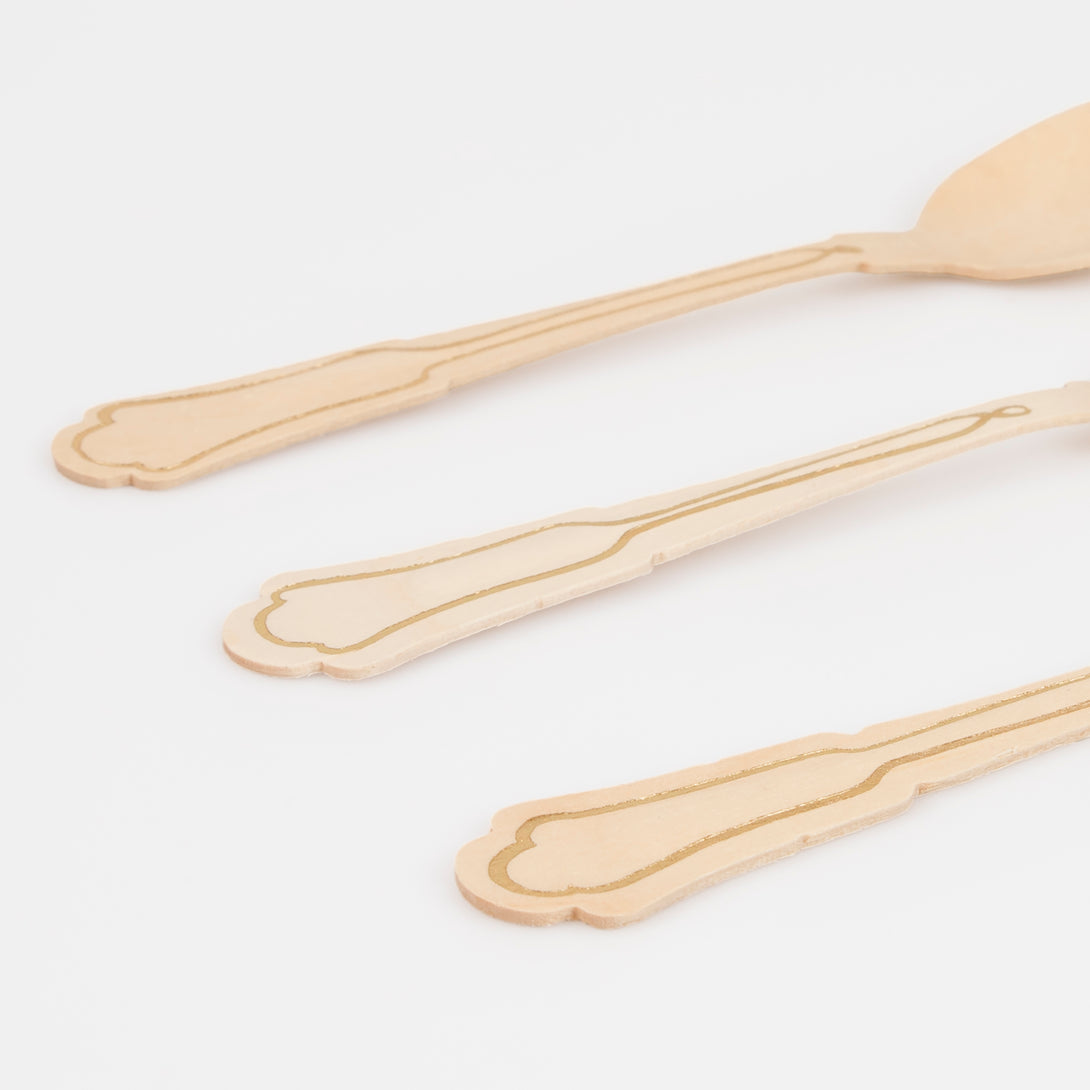 Our wooden knives, forks and spoons feature gold foil details, making them perfect as garden party cutlery.