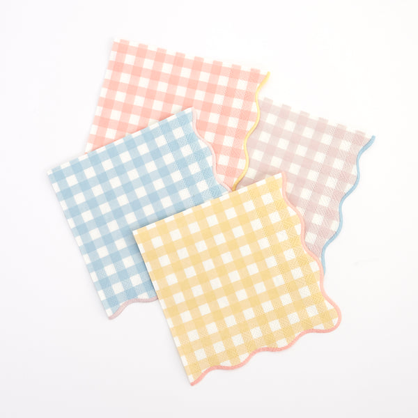 Our paper napkins with a gingham print and scalloped edge will look amazing on your party table.