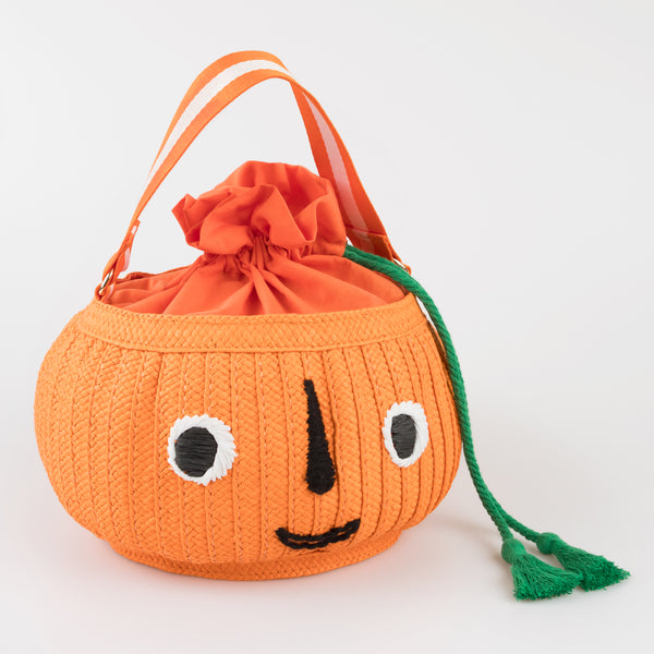 Our Halloween basket has a cute pumpkin face and fun tassels.