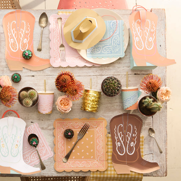 Our paper plates, in the shape of colorful cowboy boots, are perfect for a Western party. Image2