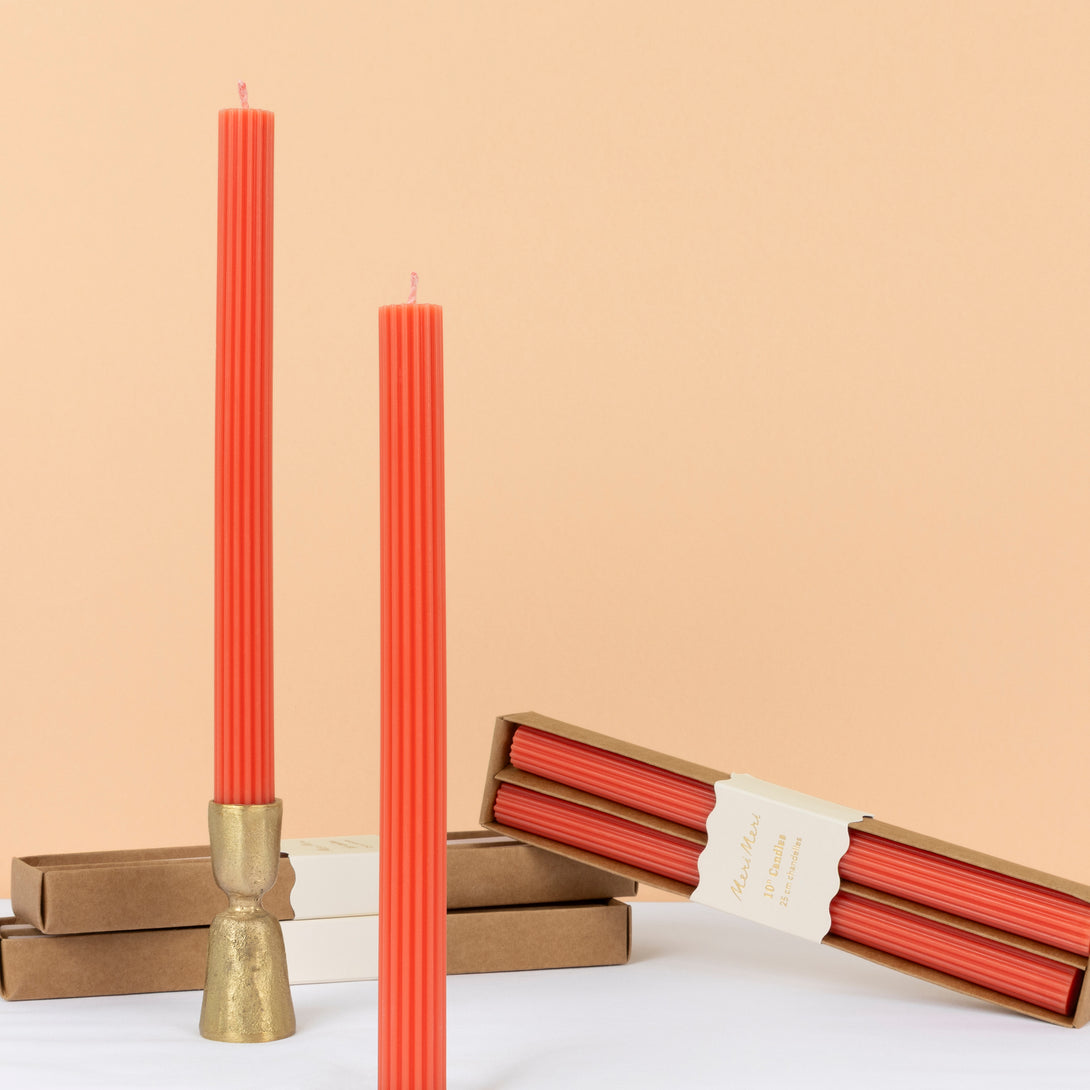 Our tall candles, in coral, are wonderful as a hostess gift or table decoration. Image1