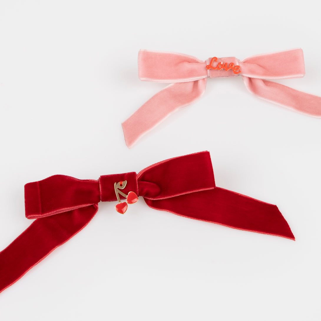 Our Valentine's hair accessories, made with soft velvet bows and enamel charms, make great Valentine's day gifts.