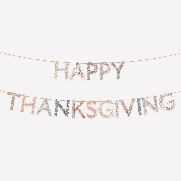 Our Thanksgiving garland, with elegant Liberty floral print designs and velvet ribbons, is wonderful to add luxury and style to your dinner. Image1