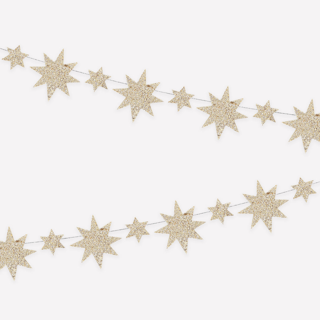 Hang up our Christmas garland, with gold glitter stars, to add a special shimmering look to your festivities. Image1