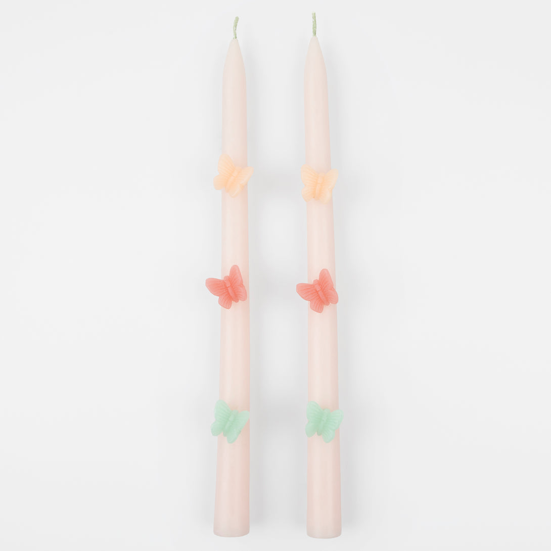 Our tall candles, in pink with colored wax butterflies, are perfect as princess party candles or fairy party candles.