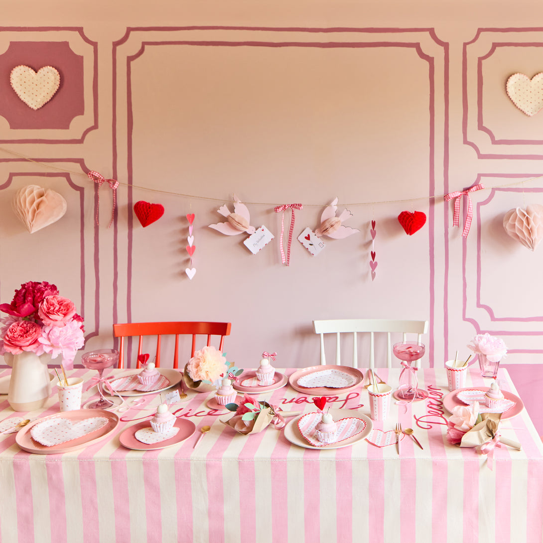 Our pink paper cups, with red roses, are the perfect party cups for a Valentine's meal.