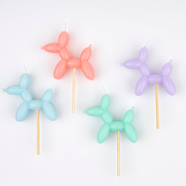 Make your birthday cake decorations look amazing with our fun candles crafted in the shapes of colorful balloon dogs. Image2