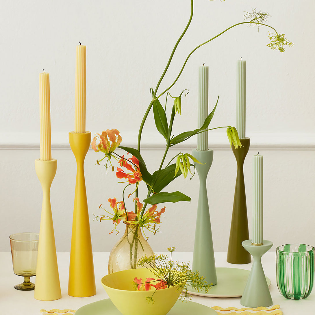 Our decorative candles in coral, pink, blue, sage and yellow will add color to your party table.