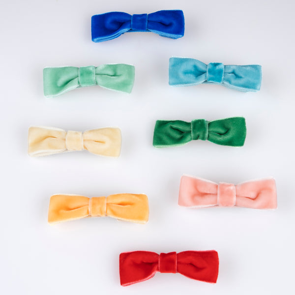 Our hair clips feature different colored velvet bows, with gold tone clips, for stylish hair accessories. Image2