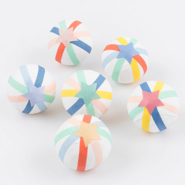 Our colorful surprise balls are the perfect way to give your guests a party hat, jokes and a special gift.
