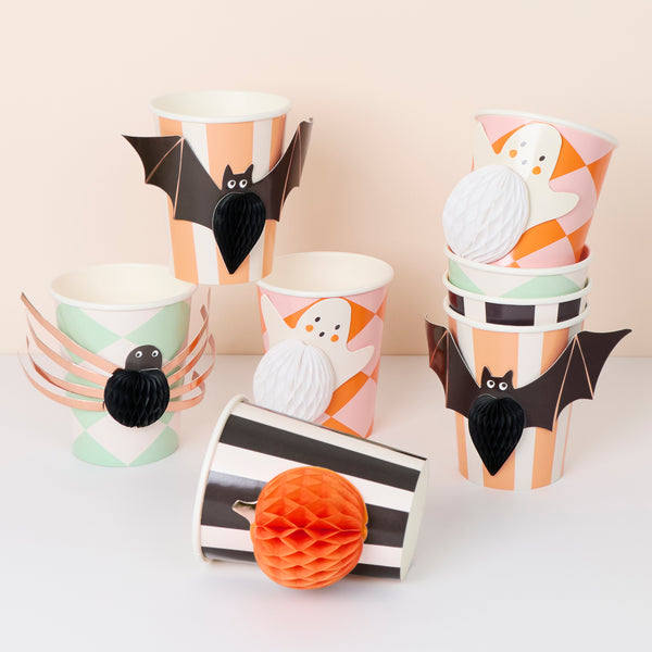 Our Halloween cups feature Halloween icons with honeycomb details, cut out shapes and lots of color and copper foil for a great effect. Image1