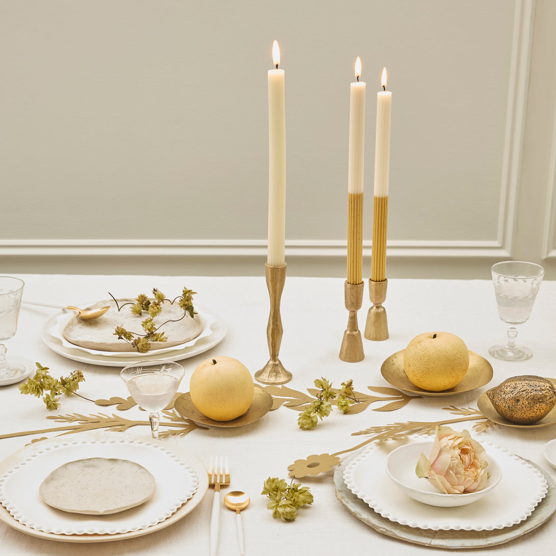 Our gold candles, with an ivory top and gold dipped base, make a wonderful table centerpiece or decoration.