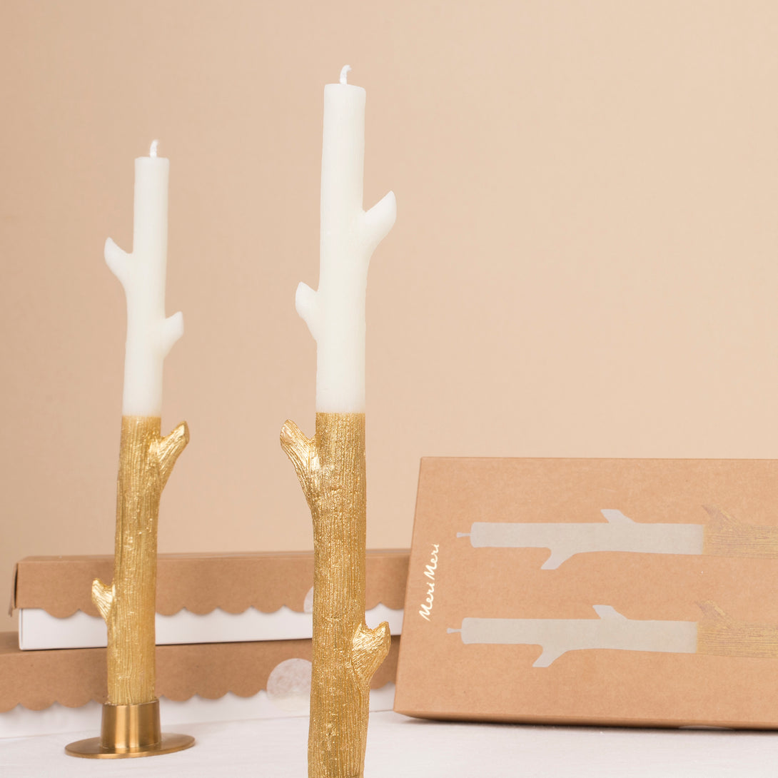 Our tall candles, in the shapes of sticks, are gold ink dipped for a really special effect - a fabulous host gift or Christmas table decoration.