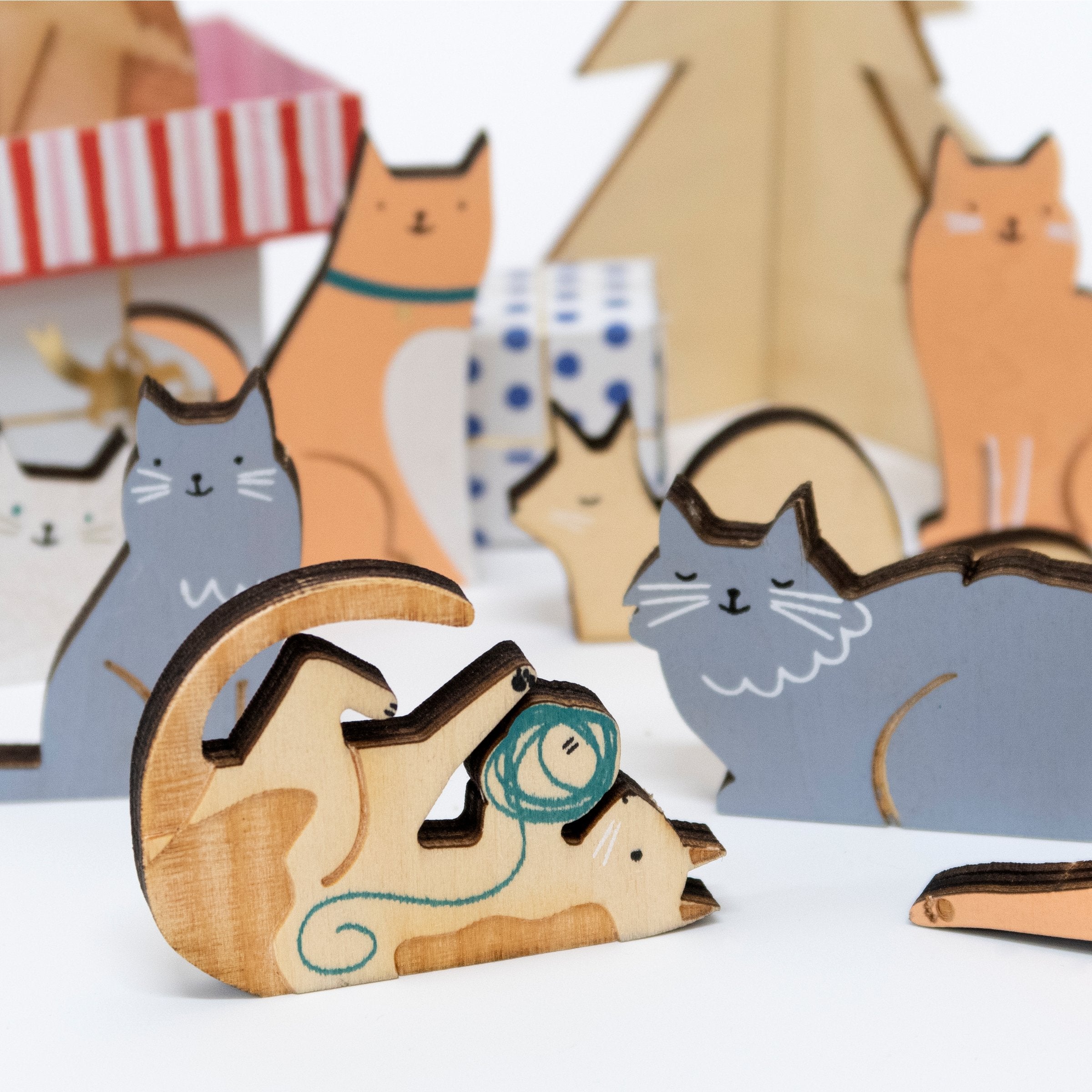 This wonderful kids advent calendar is full of kids cat toys, crafted from wood.