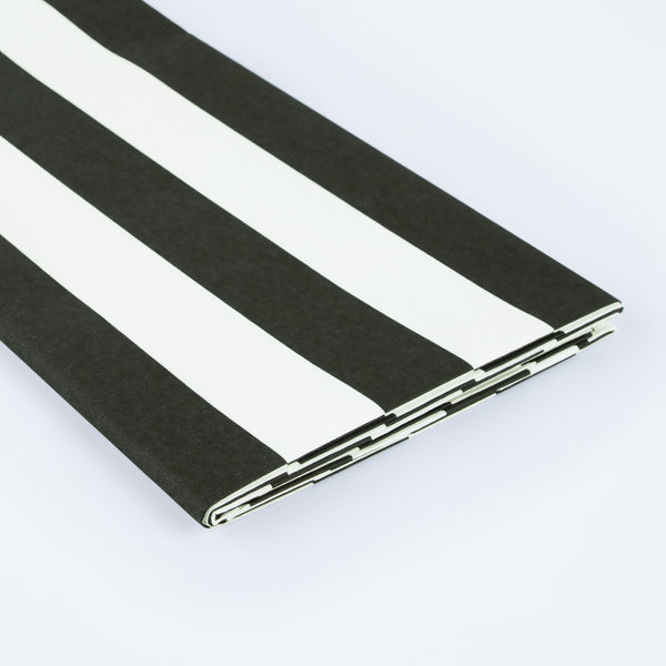 Our paper tablecloth, with black and white stripes, is an amazing Halloween tablecloth to complement your party decorations. Image2