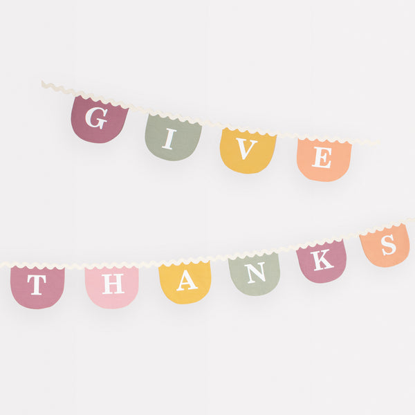 Our Thanksgiving garland, crafted in fabric, is a reusable decoration to add to your Thanksgiving party supplies.