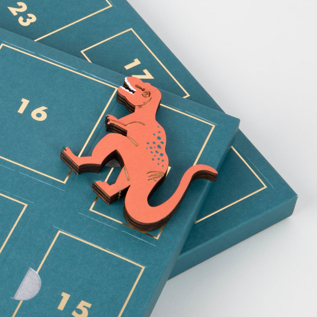 This is the perfect advent calendar for boys, featuring wooden dinosaur toys.