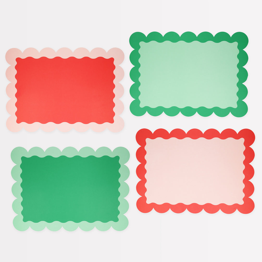 Our paper placemats are crafted in Christmas colors of red and green, with a modern pop of pink, and stylish scalloped edges.