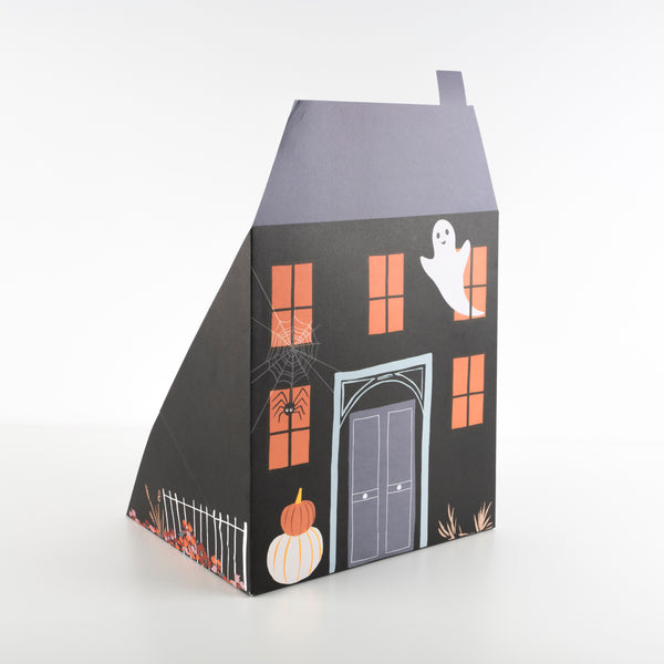 If you're looking for a Halloween toy then this play house, with a paper doll cat and lots of Halloween stickers , is perfect.