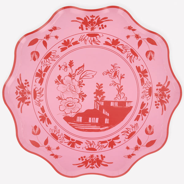 Our pink plates, made from high-quality paper, feature a bridge and botanical illustration in bright pink, with a soft pink background. Image1