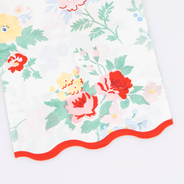 Our paper guest towels, with a vintage floral design and modern pops of red, will look special in a guest bathroom or on a party table. Image2