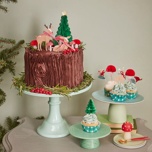 Our special Christmas cupcake kit contains woodland animals, flowers and Christmas tree toppers with striped cupcake cases. Image3