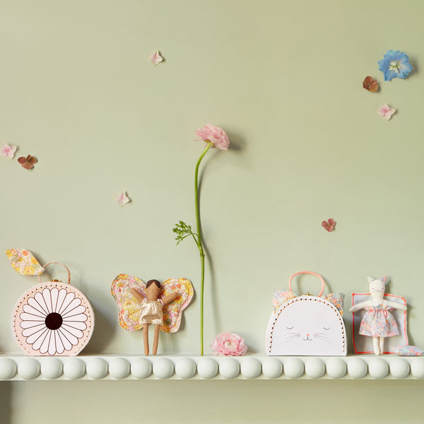 Our fabric doll and accessories, all contained in a little suitcase, is perfect to use as travel toys. Image2